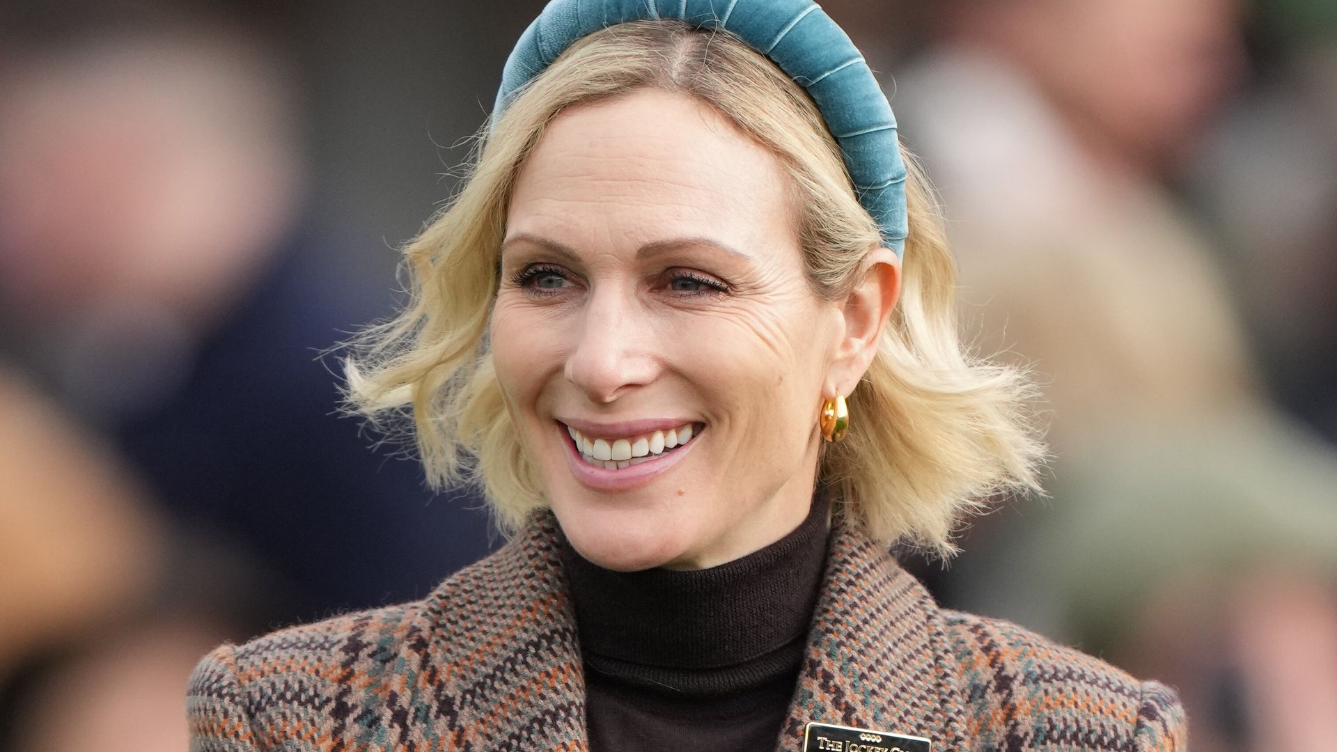 Mike and Zara Tindall dress up for New Year's Day fun at the races with children