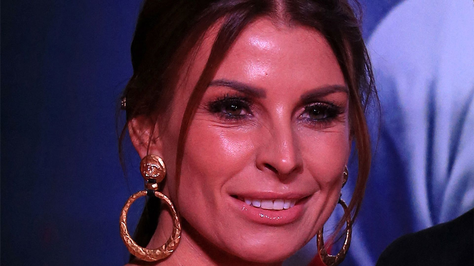 coleen rooney outfit earrings