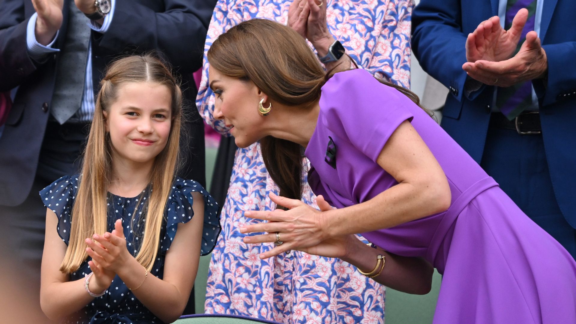 kate talking to princess charlotte in royal box 