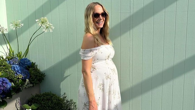 Joanne Froggatt in white dress at Wimbledon