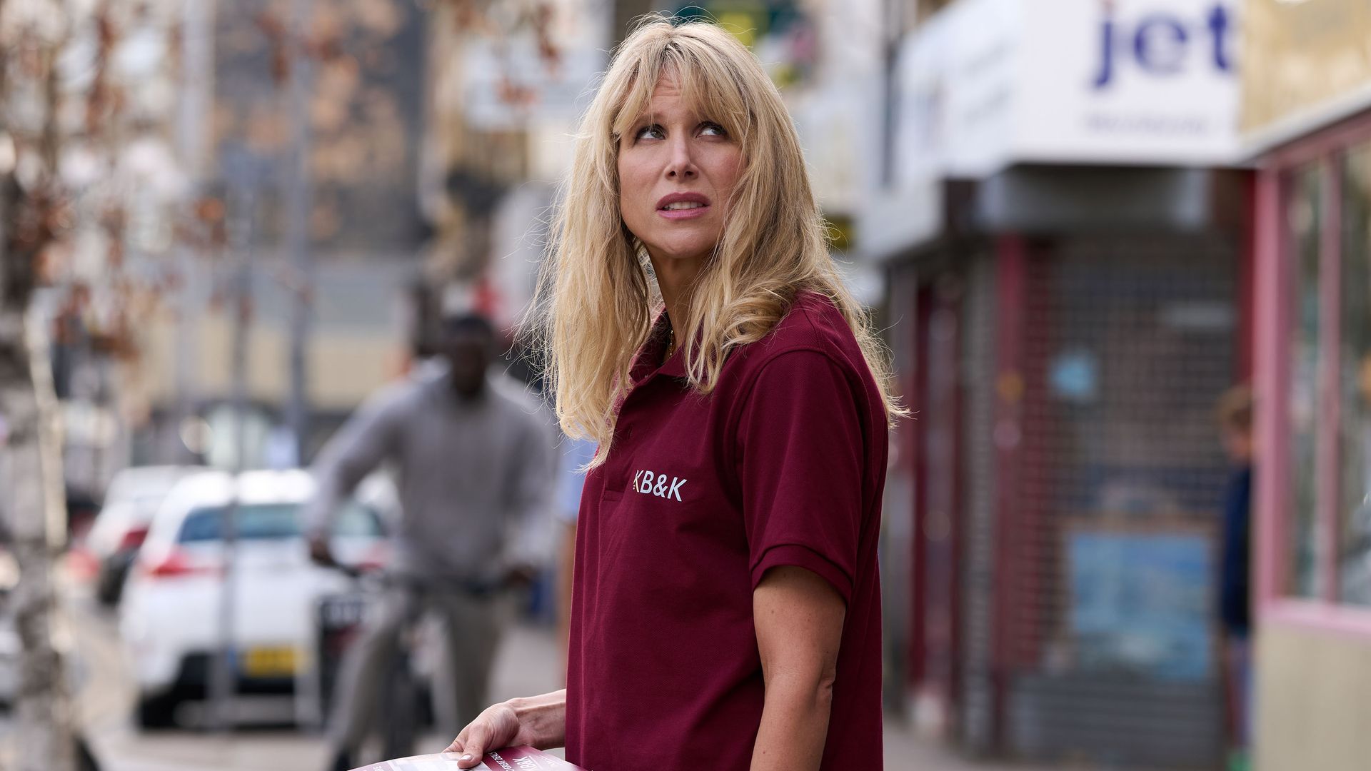 close-up woman in red top