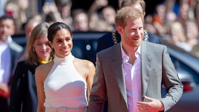 Prince Harry and Meghan Markle walking