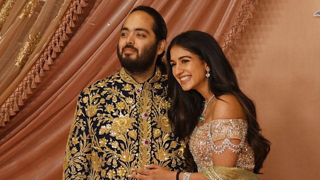 Anant Ambani and Radhika Merchant on the red carpet during the sangeet ceremony 