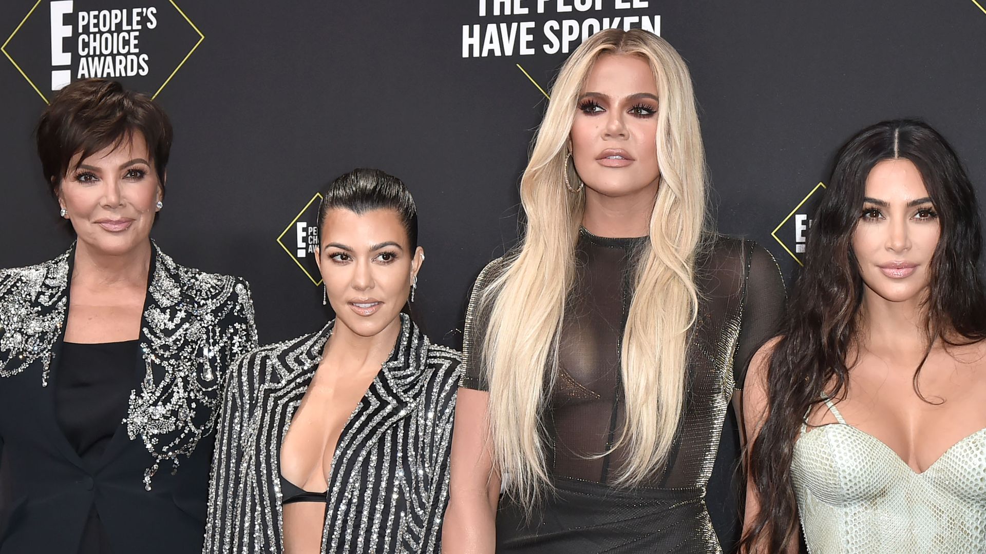 Kris Jenner, Kourtney Kardashian, Khloe Kardashian and Kim Kardashian attend 2019 E! People's Choice Awards - Arrivals at The Barker Hanger on November 10, 2019 in Santa Monica, California