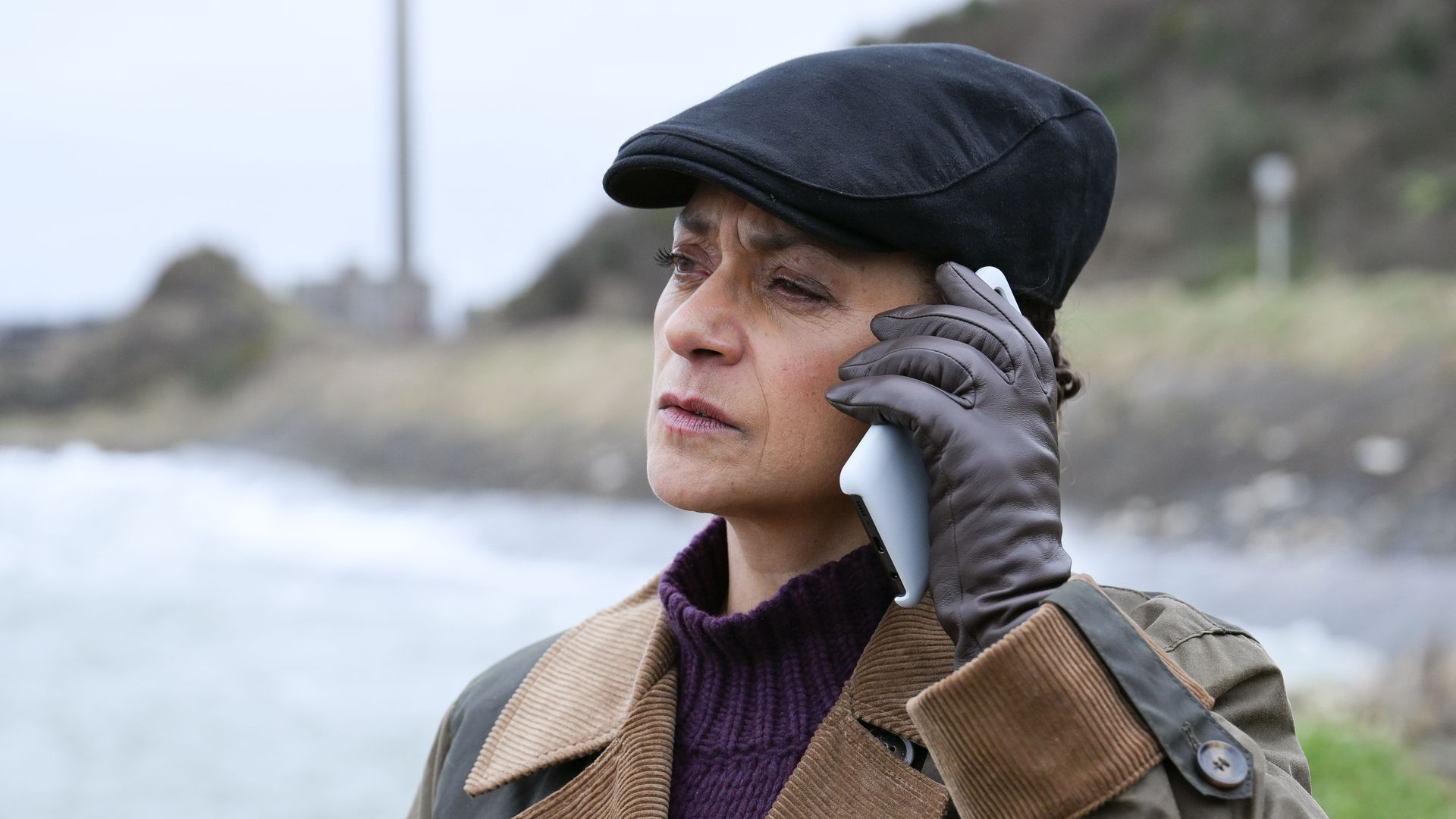 close up of woman holding phone