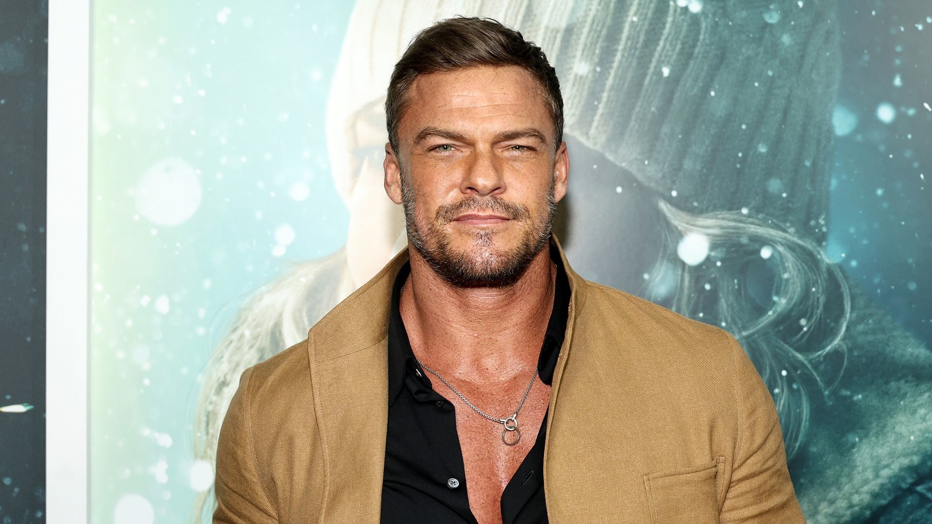 Alan Ritchson buff premiere shirt undone
