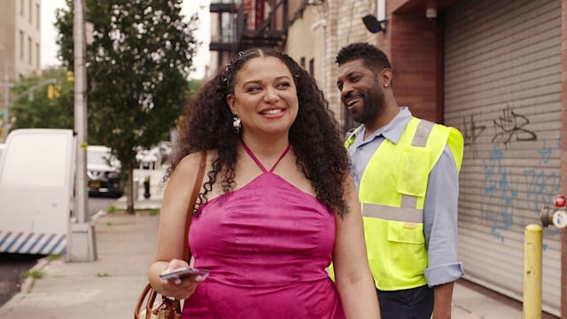 Survival of the Thickest star Michelle Buteau wearing pink halter top
