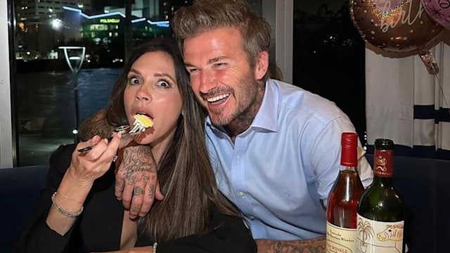 Victoria Beckham enjoying a slice of her birthday cake