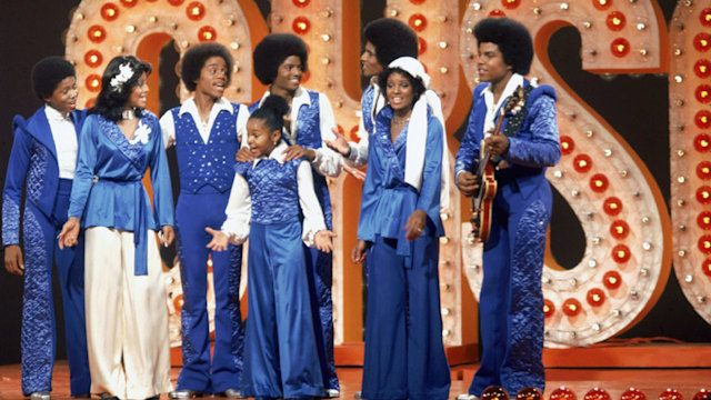 The Jackson family film a tv show at Burbank Studios, California, 13th November 1976. From left to right, Randy, La Toya, Marlon, Janet, Michael (1958 - 2009), Jackie, Rebbie and Tito