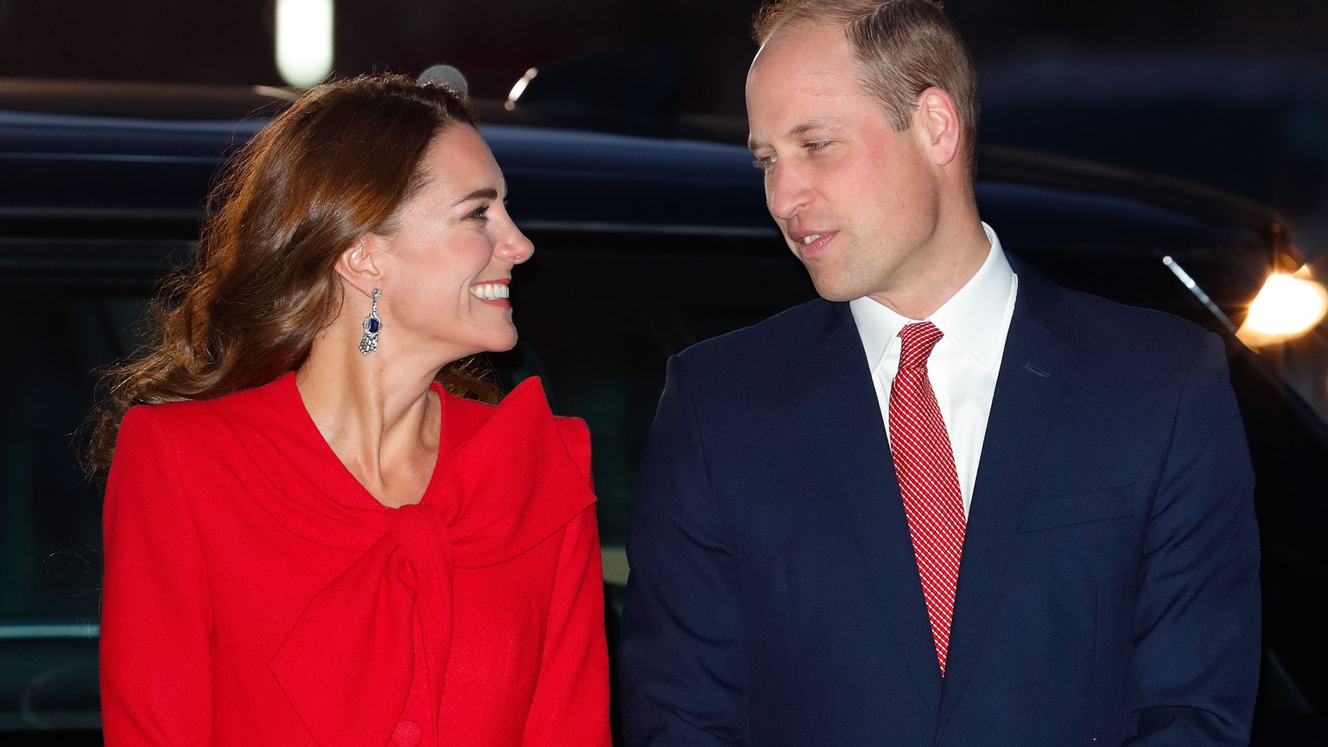 William and Kate smiling at one another at Christmas concert in 2021