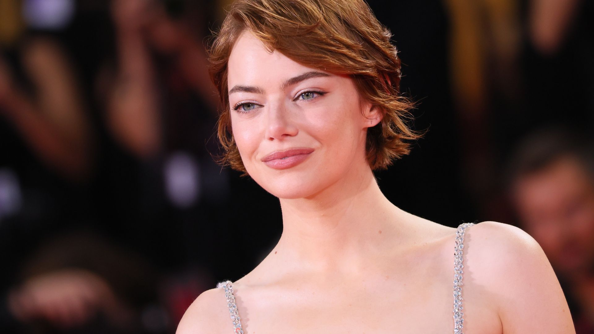 Emma Stone auburn pixie cut crop