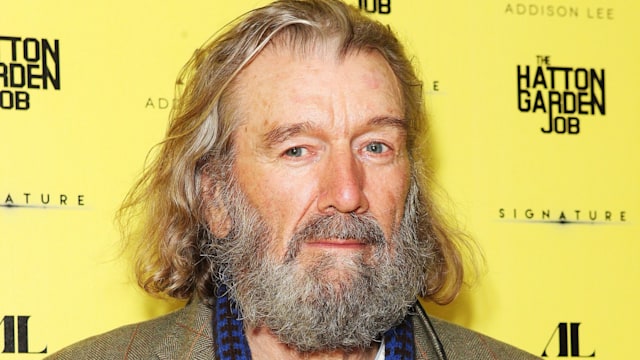 Clive Russell attending premiere in tweed jacket 