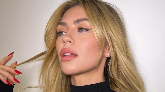 Abbey Clancy wearing black top in Instagram picture