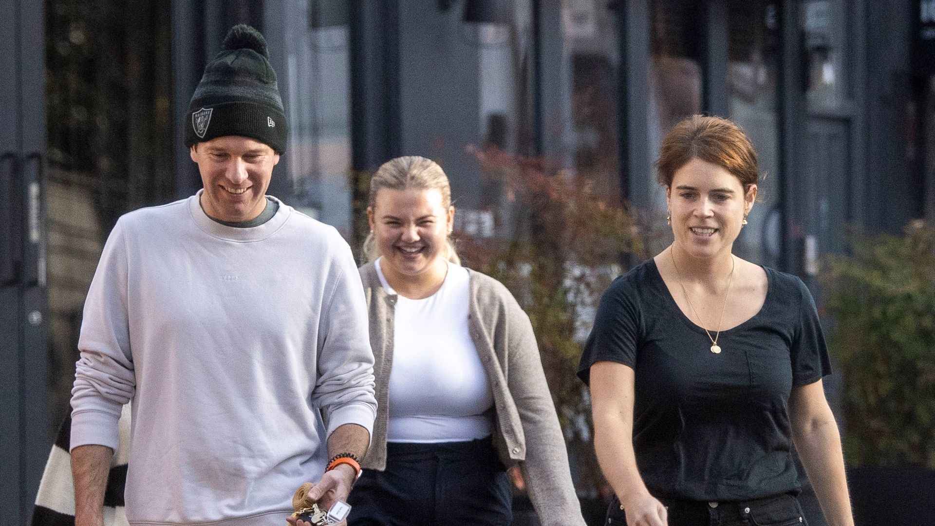 Princess Eugenie walking with Jack Brooksbank and a friend