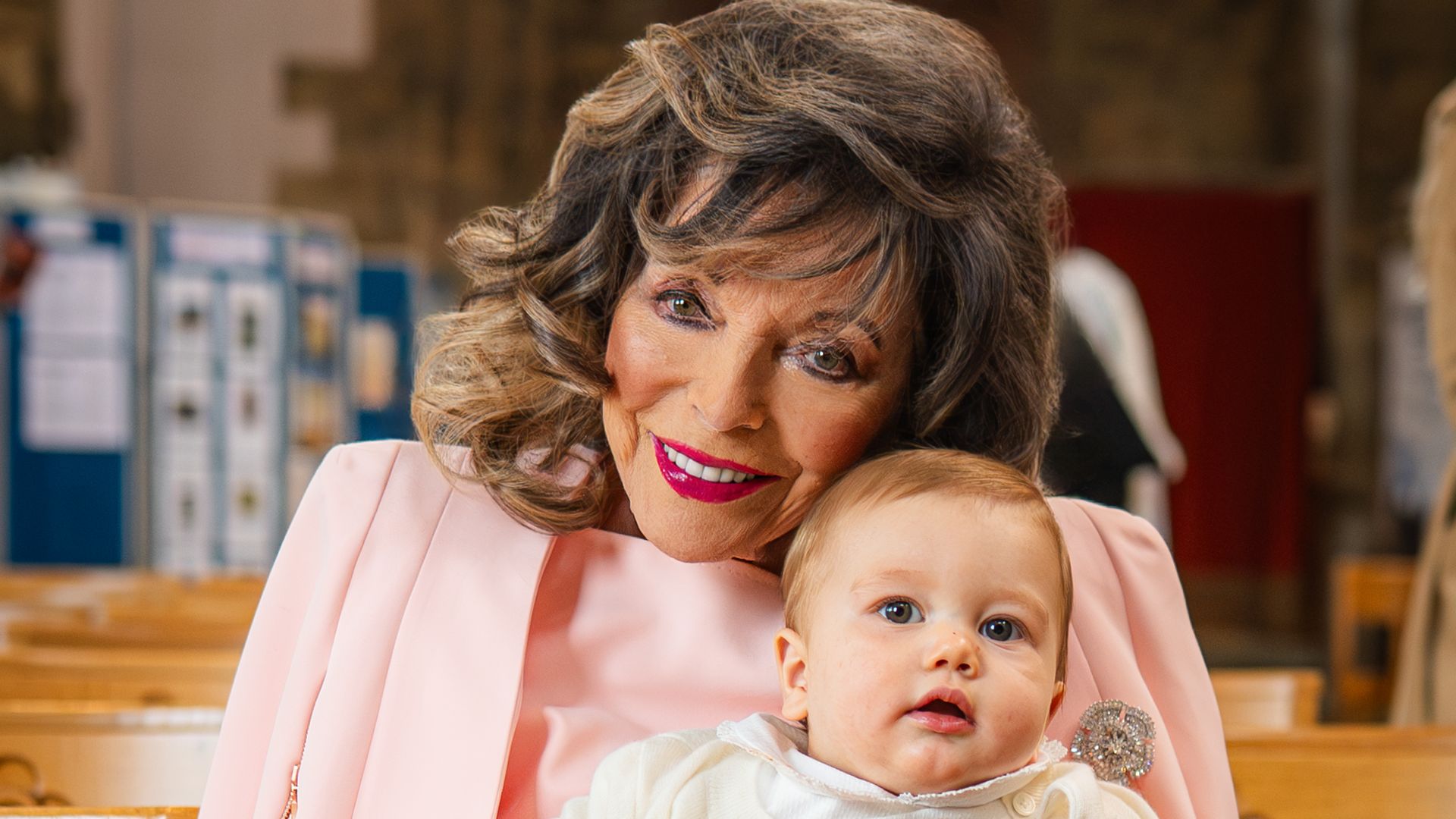 Dame Joan Collins 'delighted' after becoming a godmother for 15th time