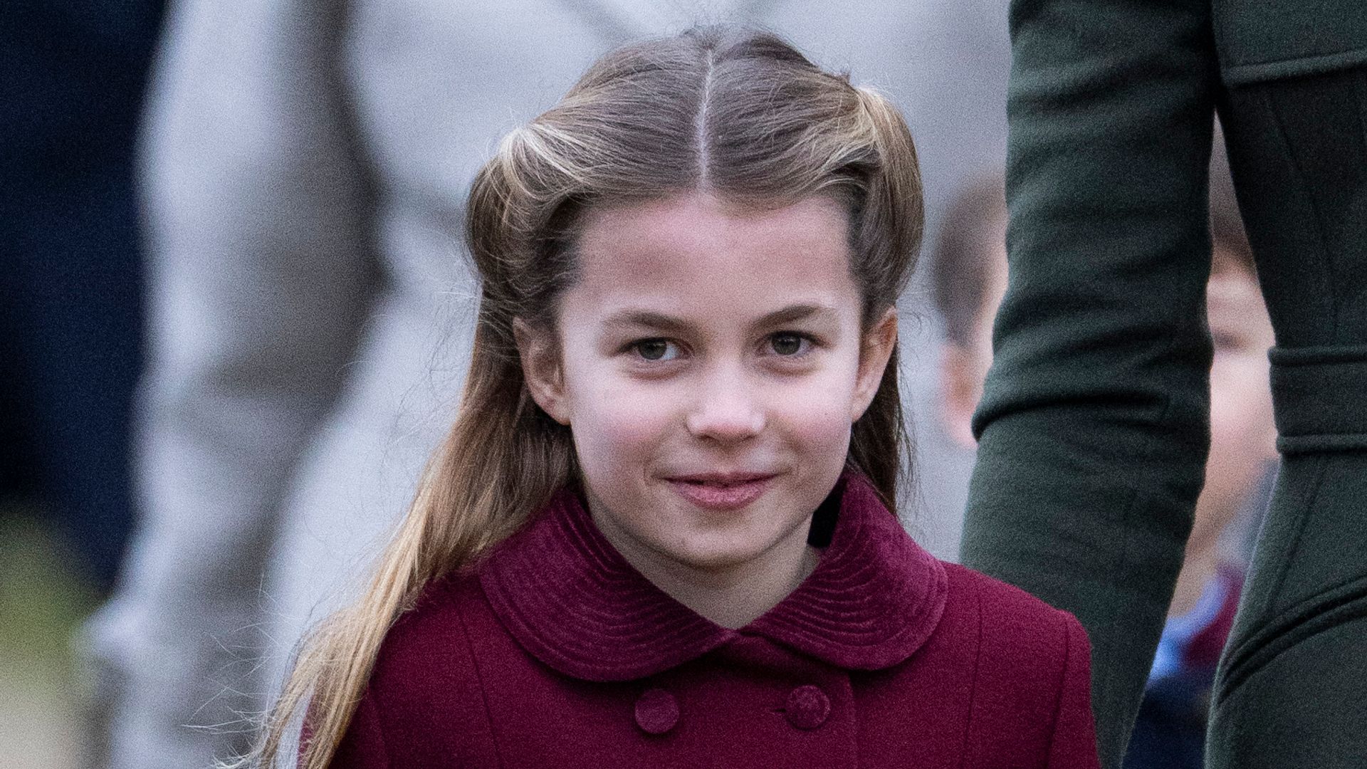 Princess Charlotte in a red coat