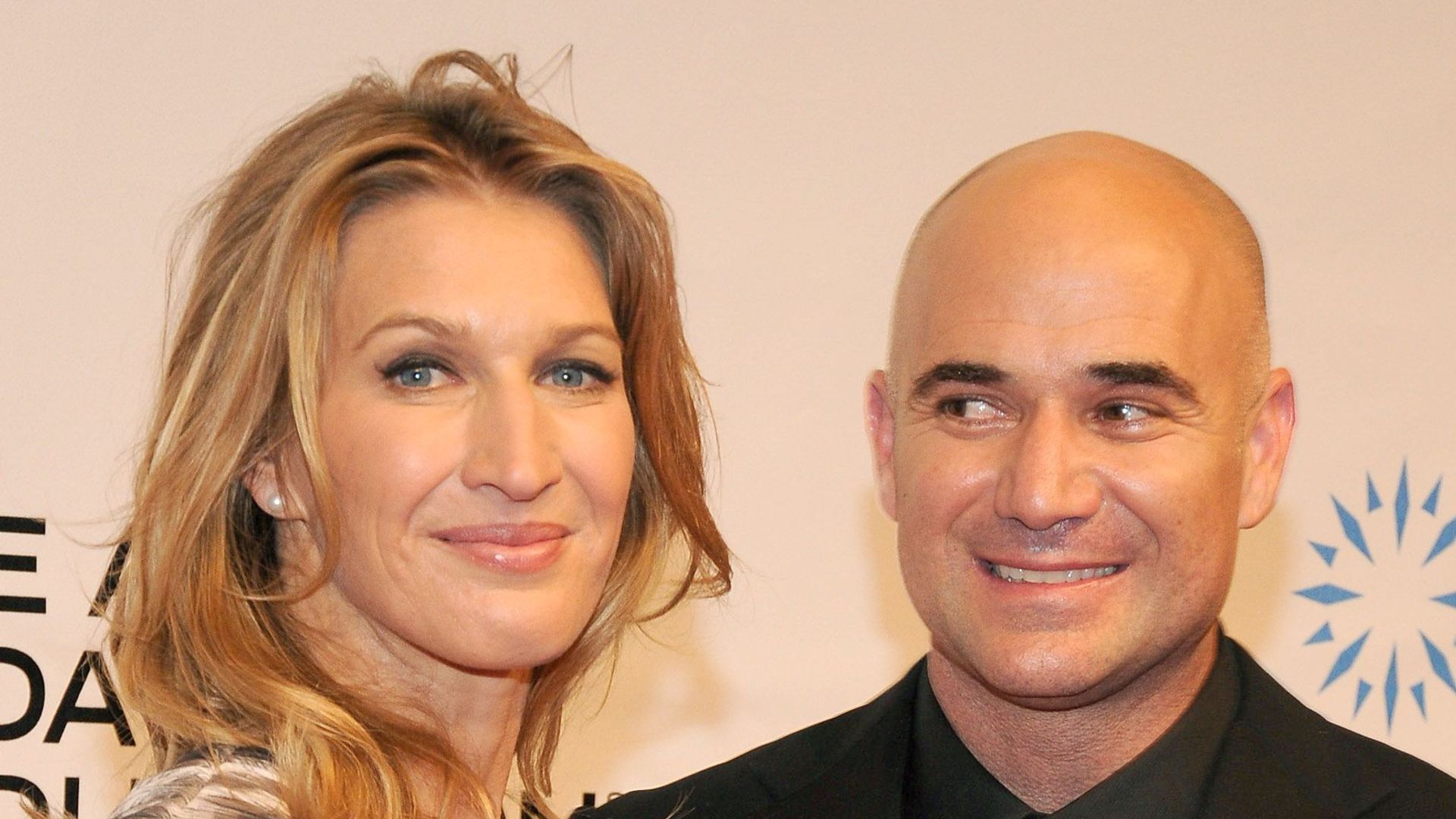 steffi graf posing on red carpet with andre agassi 