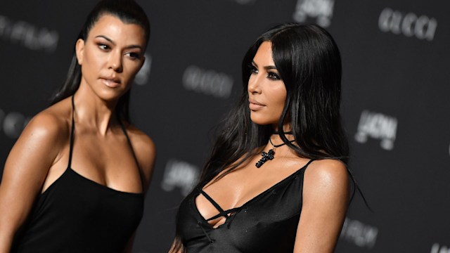 Kim Kardashian and Kourtney Kardashian on the red carpet 