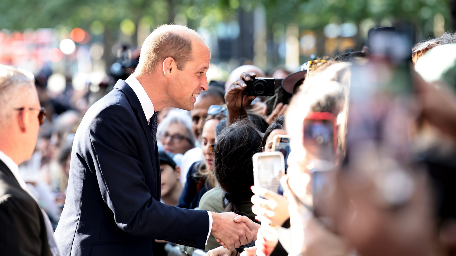 William greets members of the public in New York
