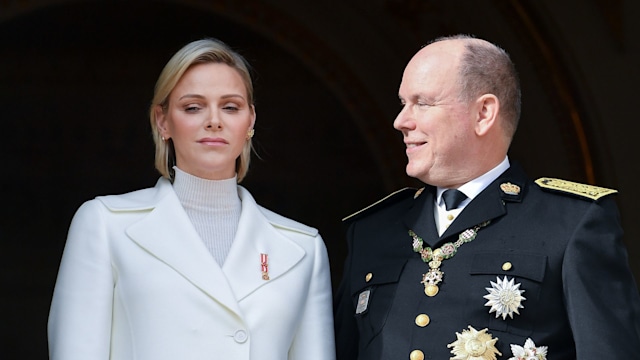   Princess Charlene of Monaco and Prince Albert II of Monaco pose at the Palace balcony during the Monaco National Day Celebrations 