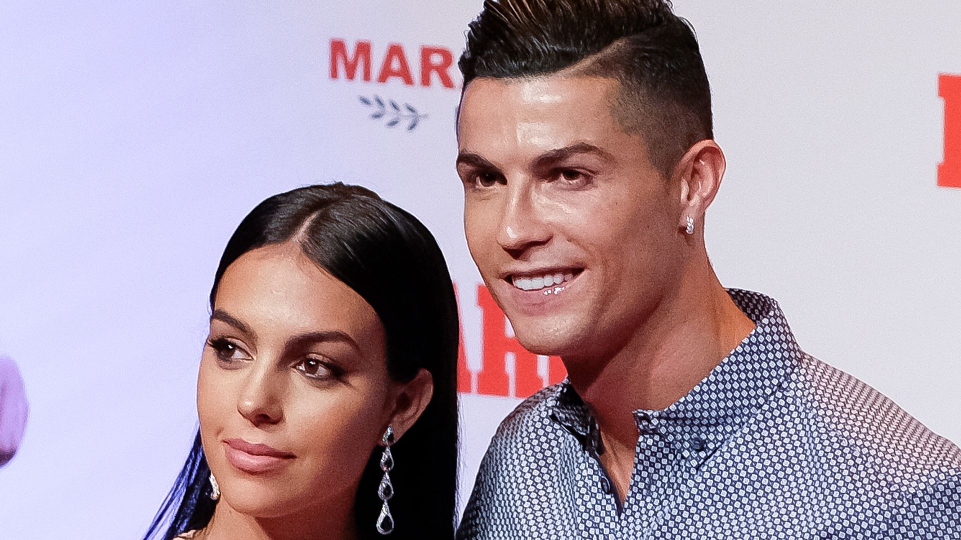 Cristiano Ronaldo and Georgina Rodriguez posed with trophy