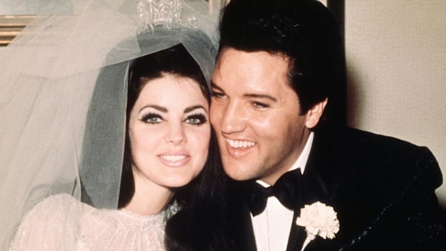 Las Vegas, Nev..Entertainer, Elvis Presley sits cheek to cheek wit his bride, the former Priscilla Ann Beaulieu, following their wedding May 1, 1967.