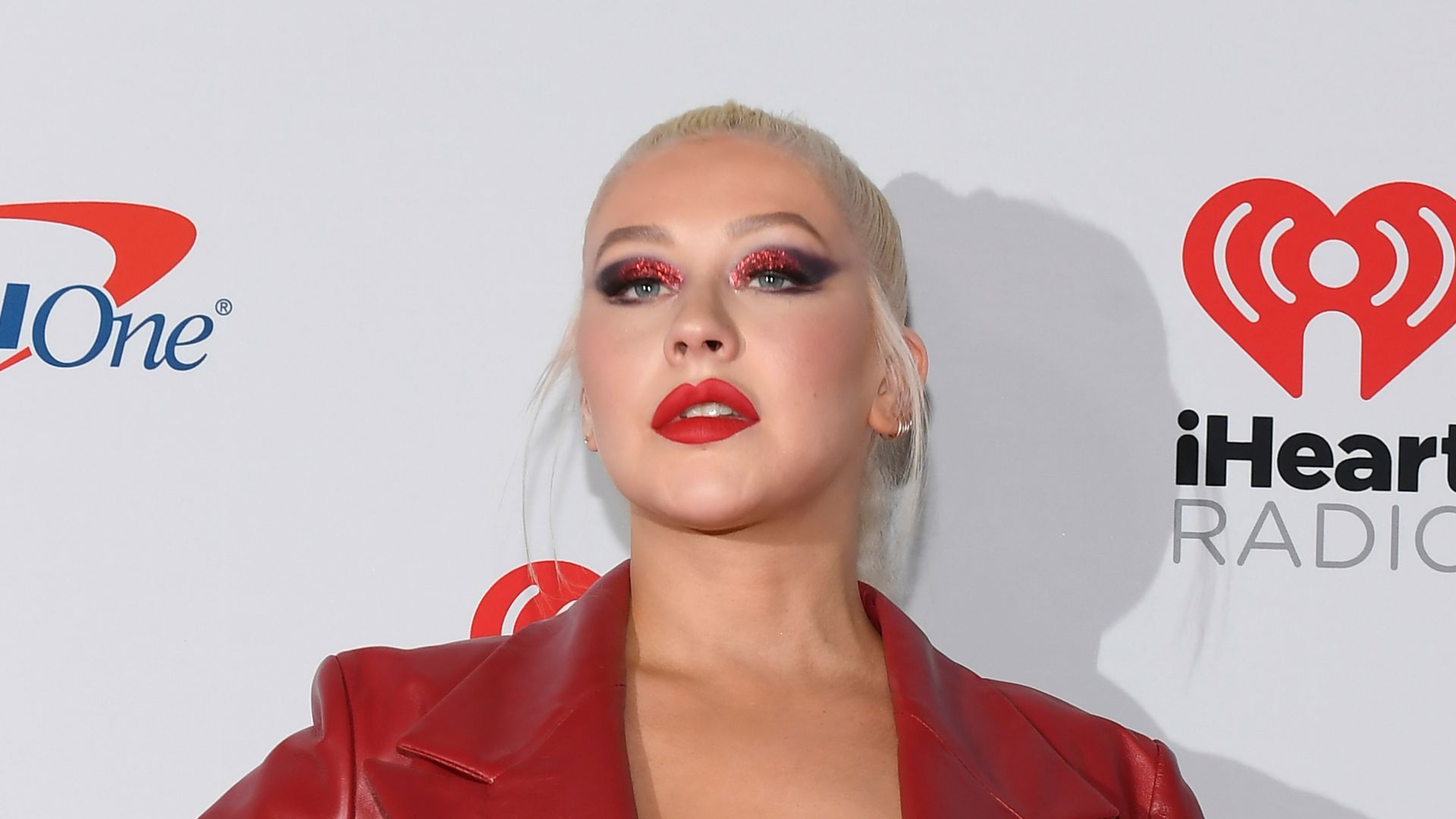 Christina Aguilera steps out in burgundy hotpants ahead of 45th birthday