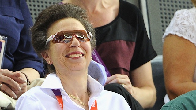 Princess Anne laughing wearing a white shirt