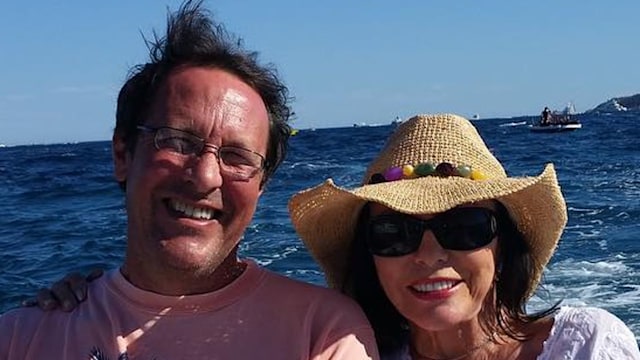 couple posing on boat 