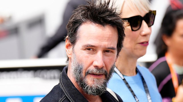 Keanu Reeves canadian actor and musician during and his wife Alexandra Grant the race day of the Liqui Moly Motorrad Grand Prix Deutschland at Sachsenring Circuit on July 7, 2024 in Hohenstein-Ernstthal, Germany.