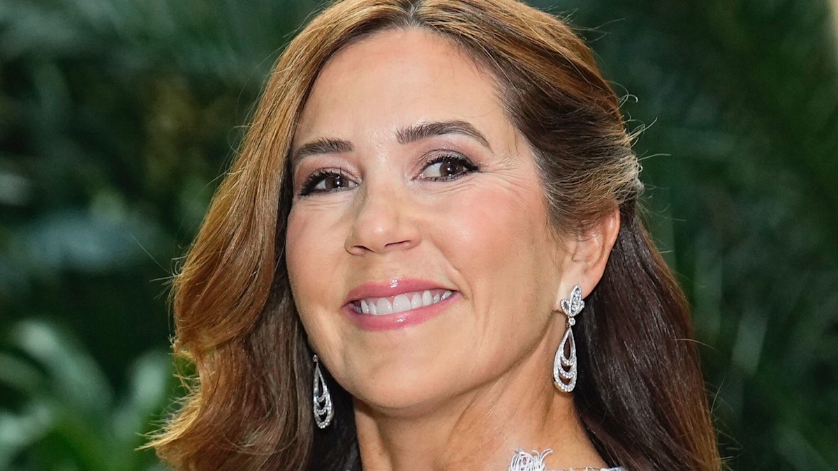 Queen Mary oozes glamour in figure-flattering belted dress