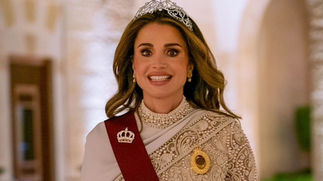 Queen Rania in a cream dress and tiara 