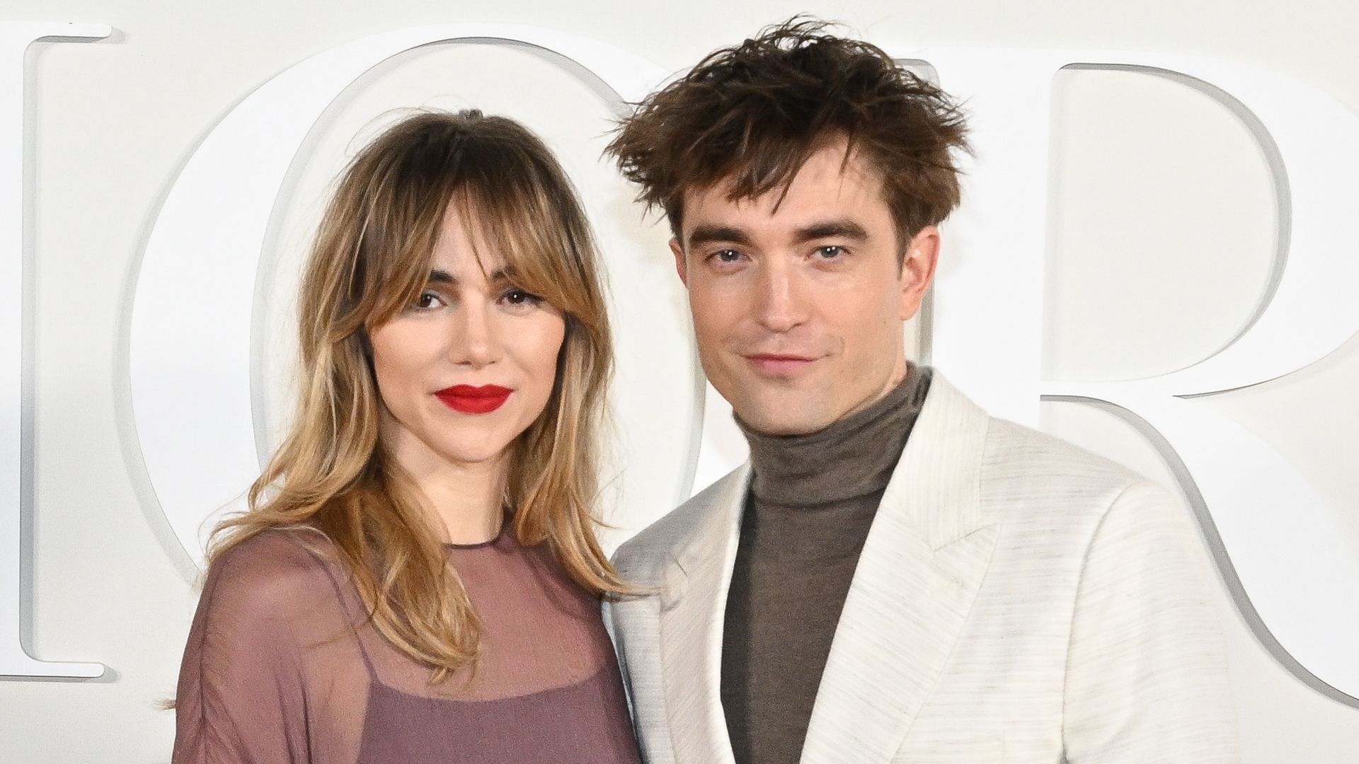 Suki Waterhouse and Robert Pattinson attend the Dior Fall 2023