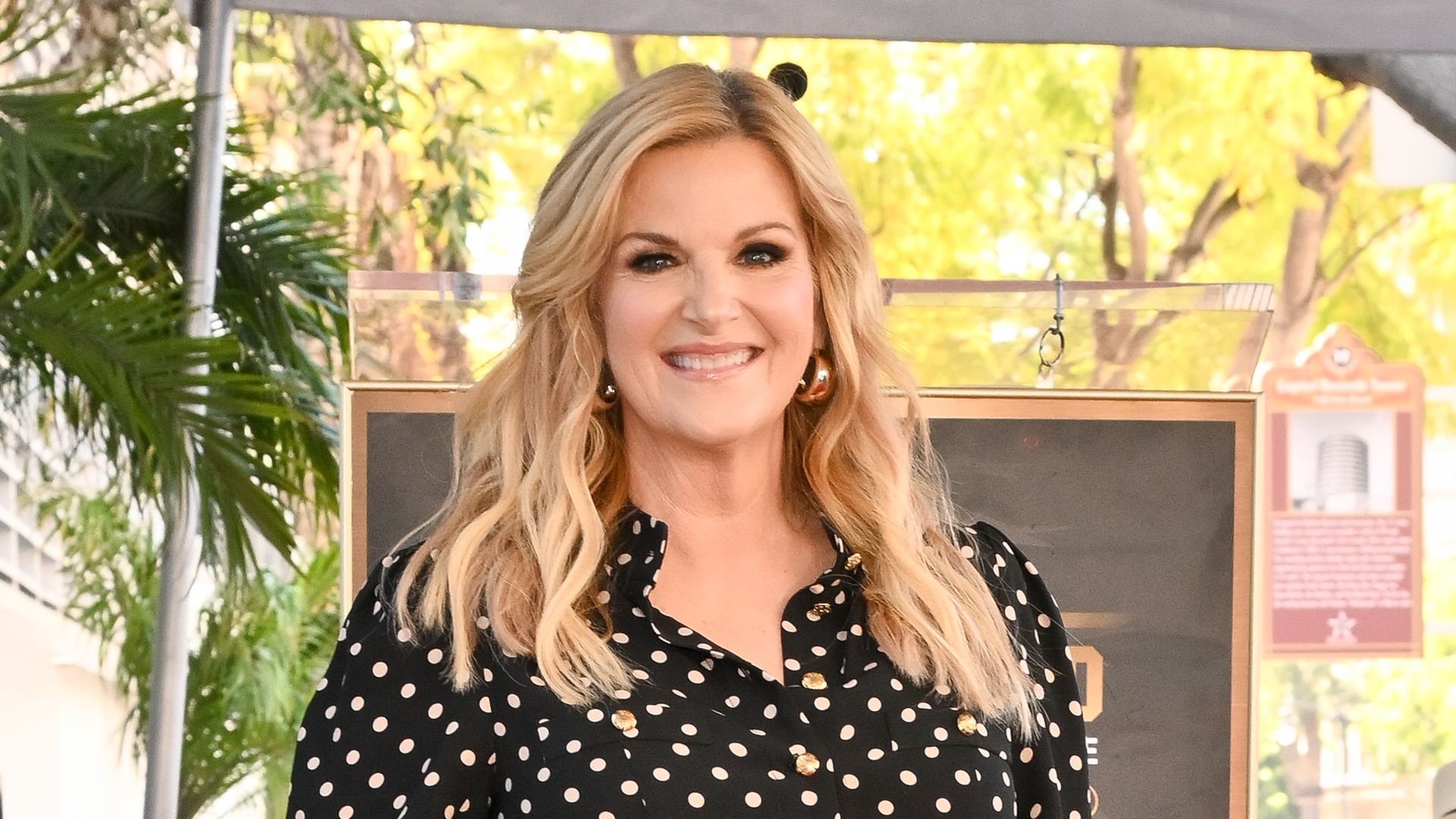 Trisha Yearwood, 61, stuns in festive red as she talks new project