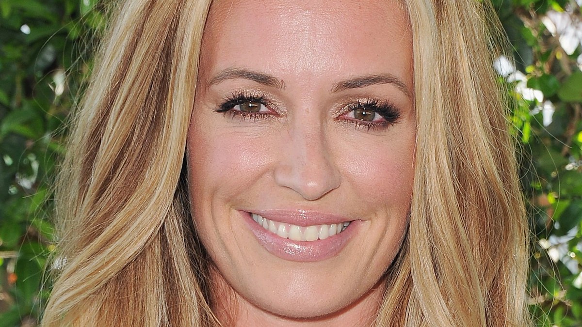 Cat Deeley, 47, looks half her age in a skimpy bikini and £20 sarong from M&S