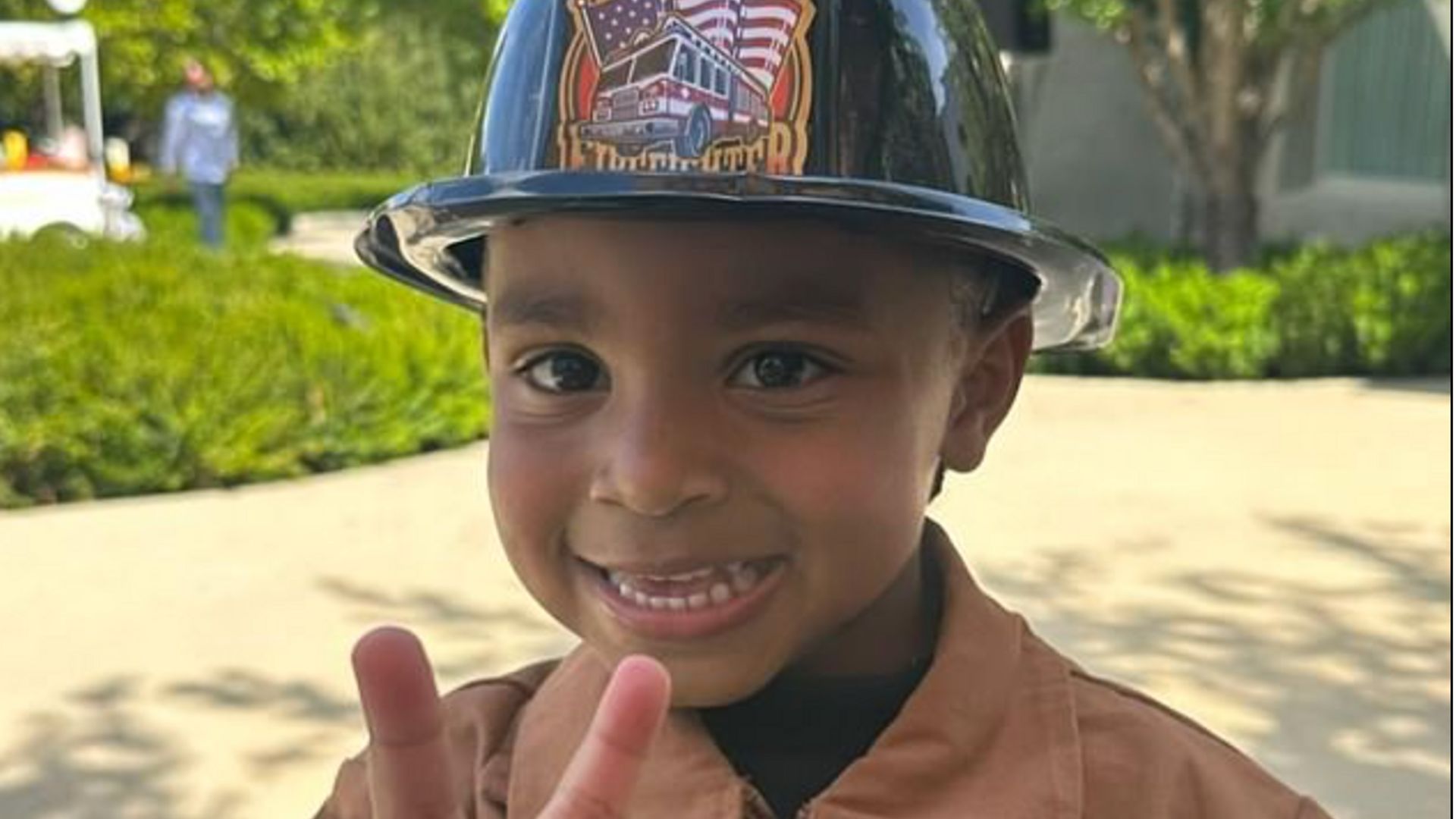Kim's son dressed up as a fireman