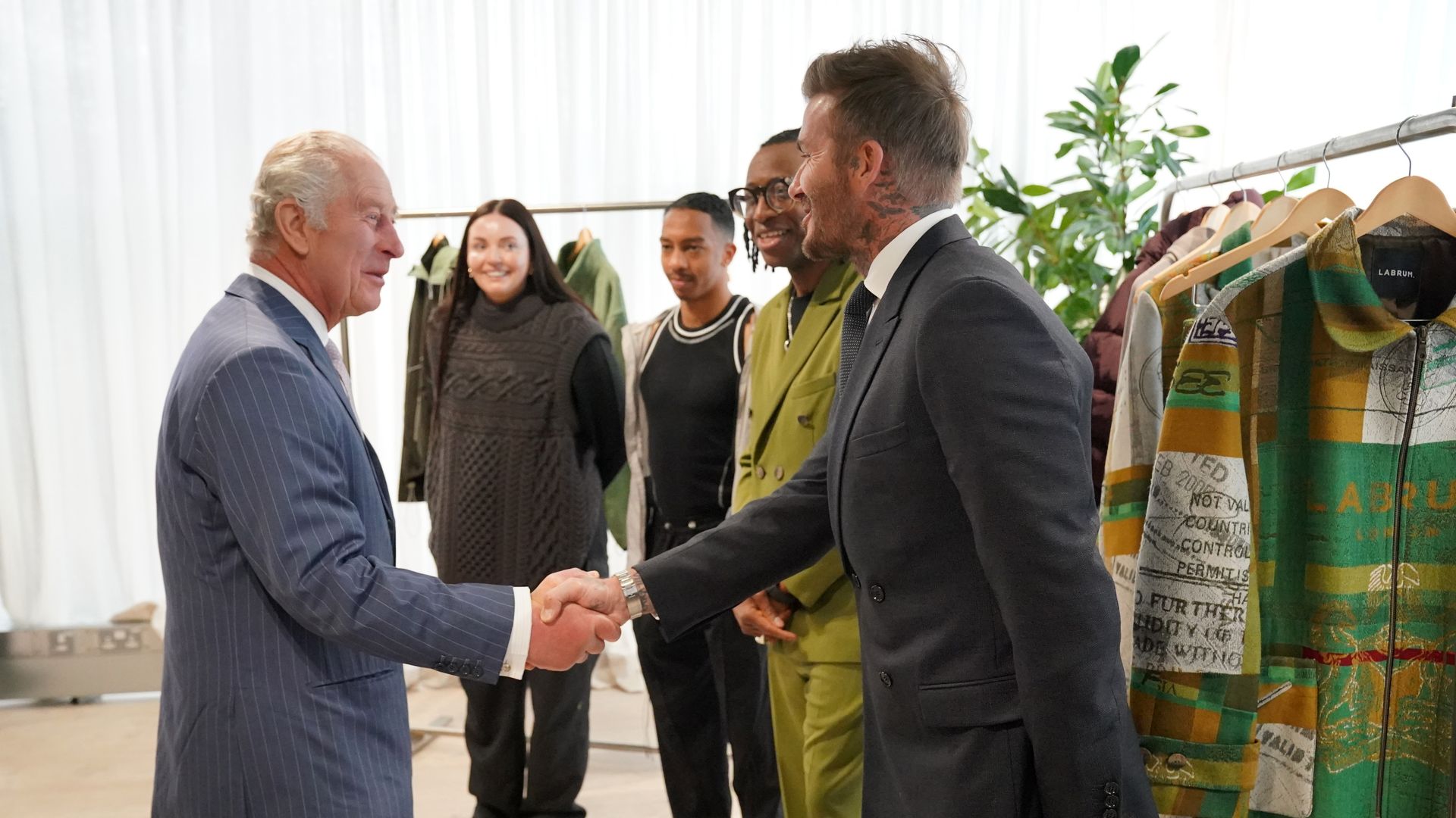 David Beckham shaking King Charles' hand