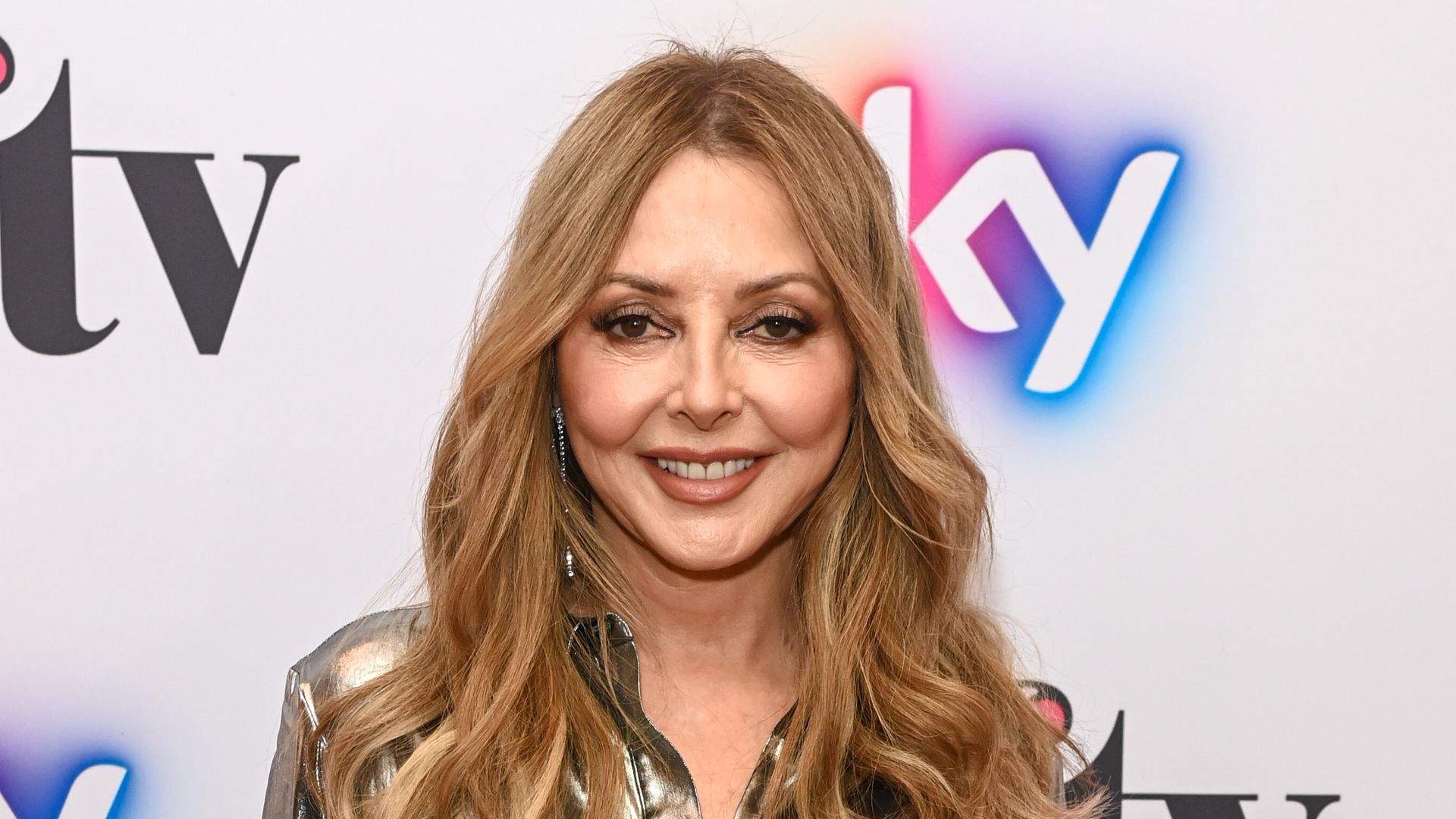 Carol Vorderman proudly flaunts her 'size 9' figure in flattering sequins
