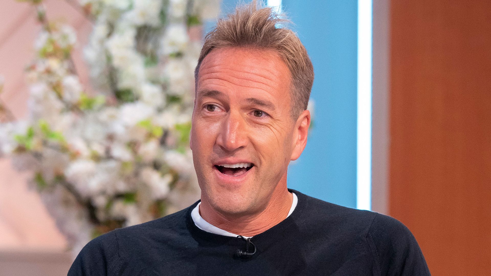 Ben Foggle speaking on Lorraine in a navy jumper