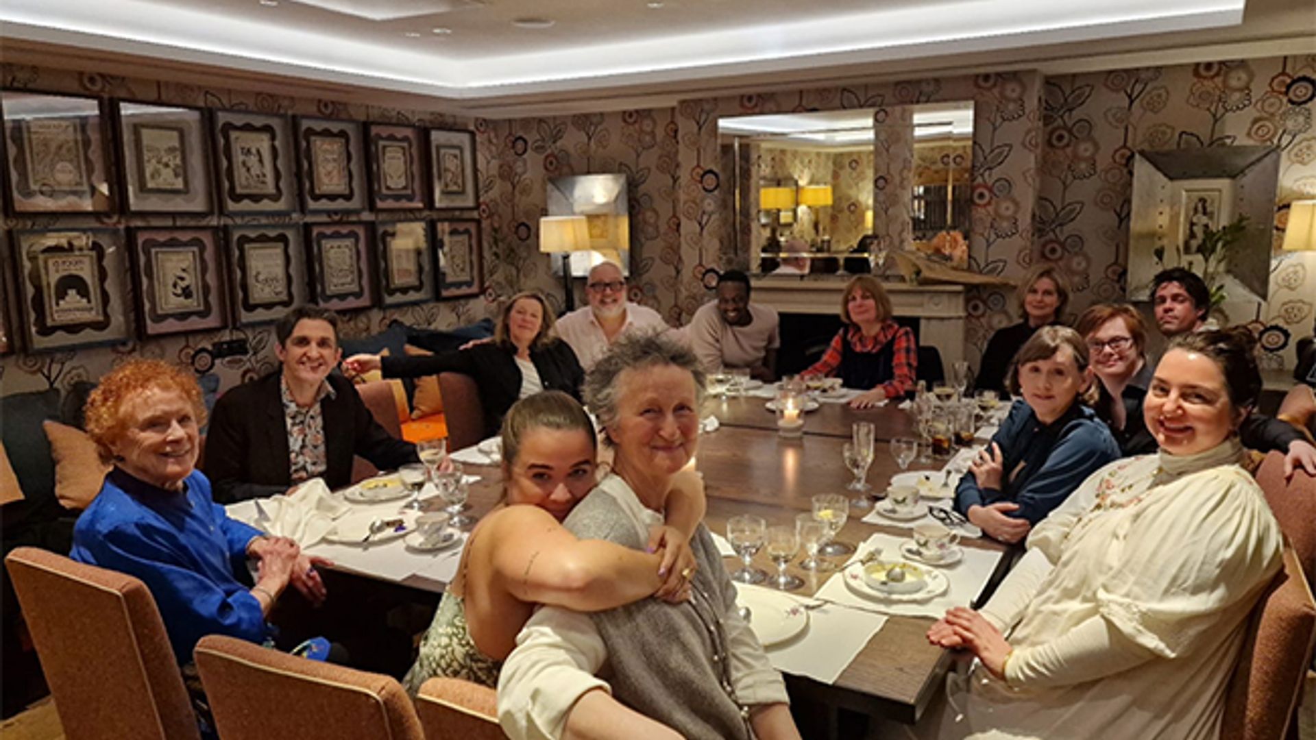 The Call The Midwife cast pose for a photo as they enjoy a meal in London