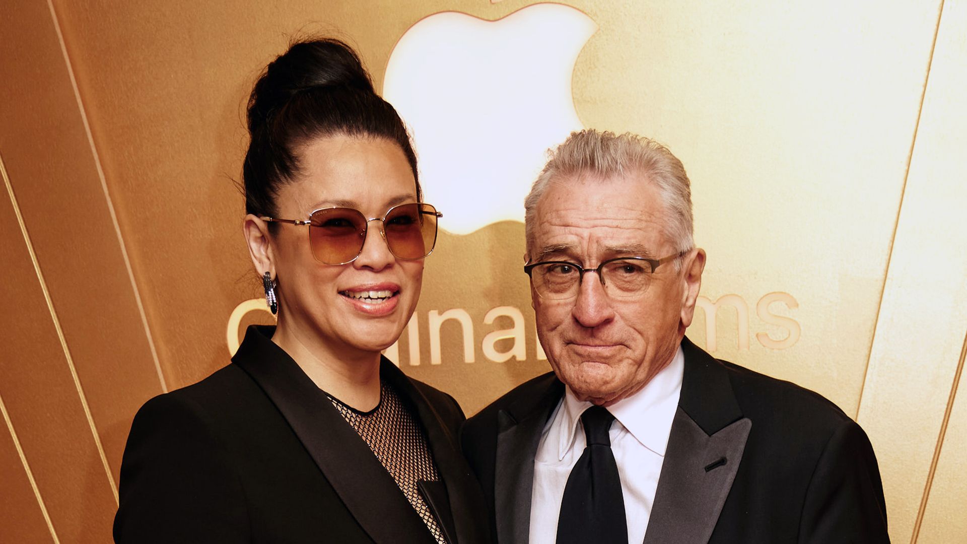Tiffany Chen (L) and Robert De Niro attend the Apple Original Films Oscars celebration at the Sunset Tower Hotel on March 10, 2024 in Los Angeles, California.