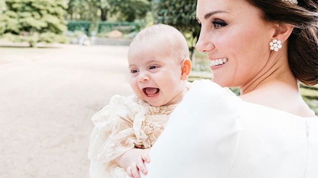 prince louis new christening photo smiling