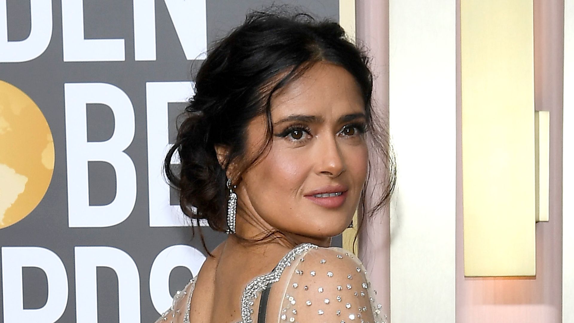 Salma Hayek sends temperatures soaring in daring string dress HELLO!