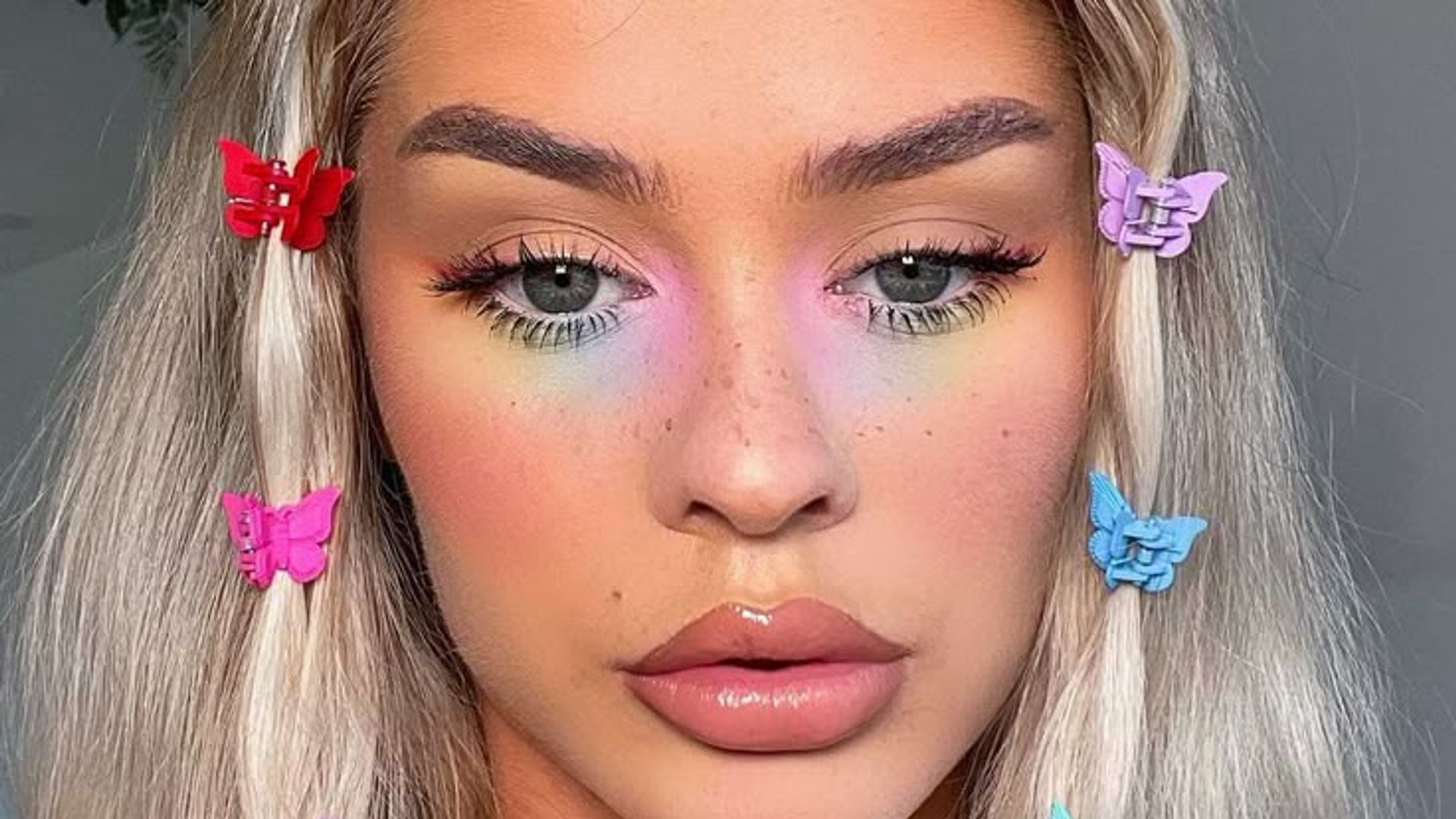festival hair woman with butterfly clips in hair 