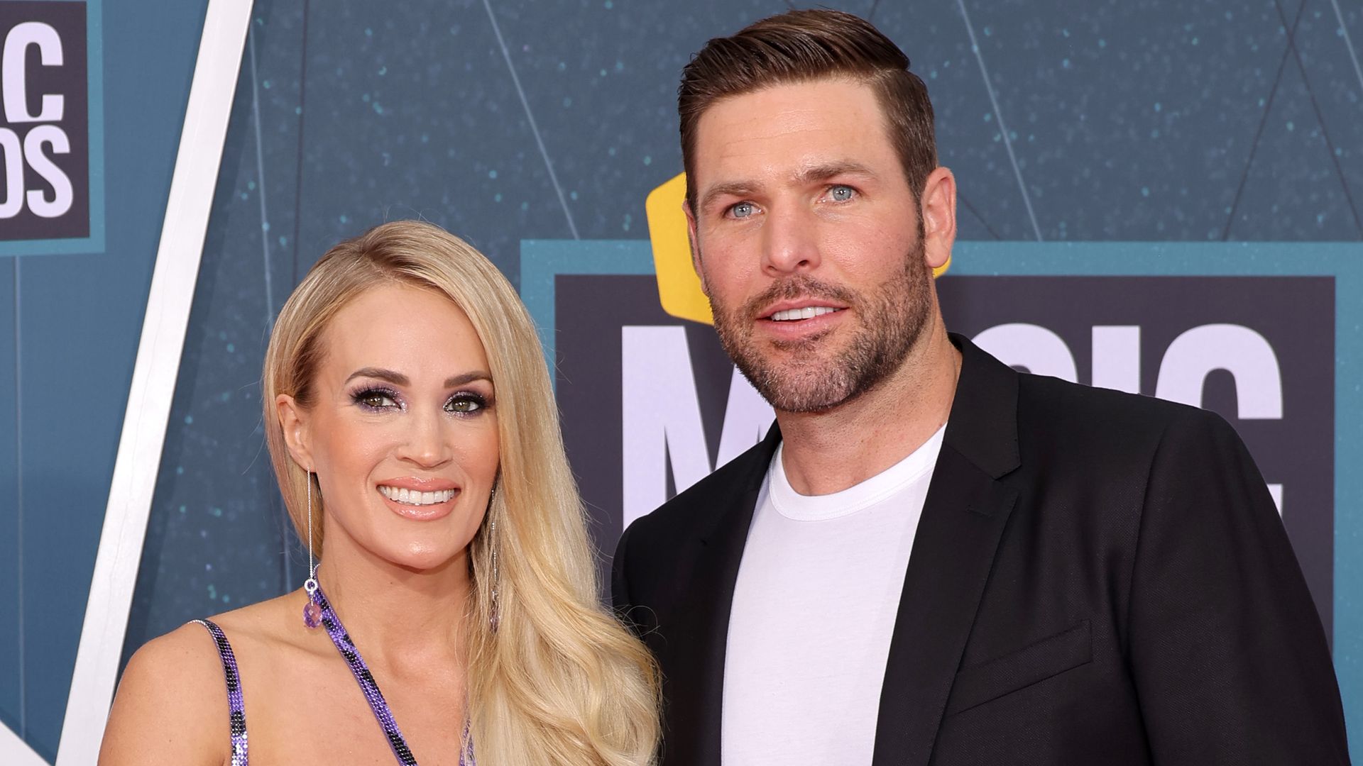 Carrie Underwood and Mike Fisher attend the 2022 CMT Music Awards at Nashville Municipal Auditorium on April 11, 2022 in Nashville, Tennessee