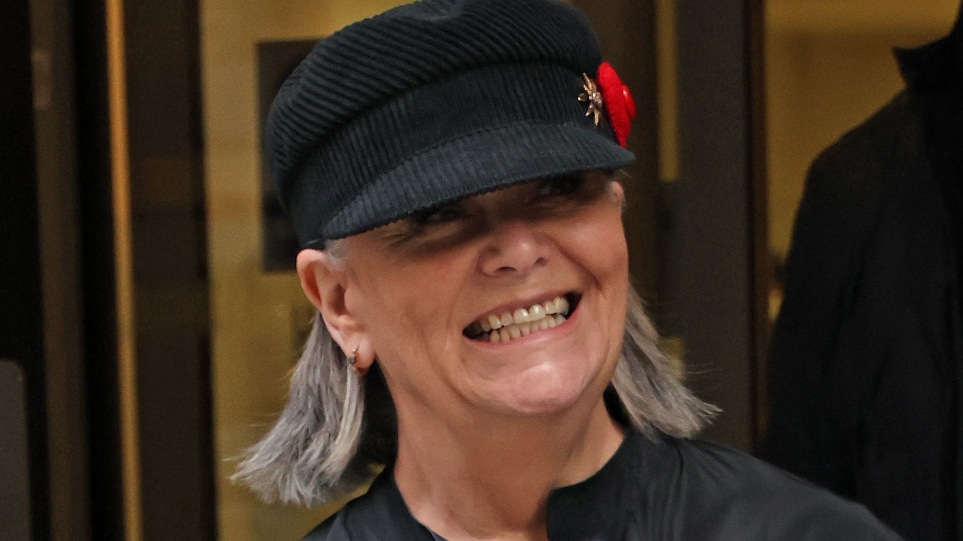 Dawn French in a black hat and jacket leaving BBC Radio 2 in 2022