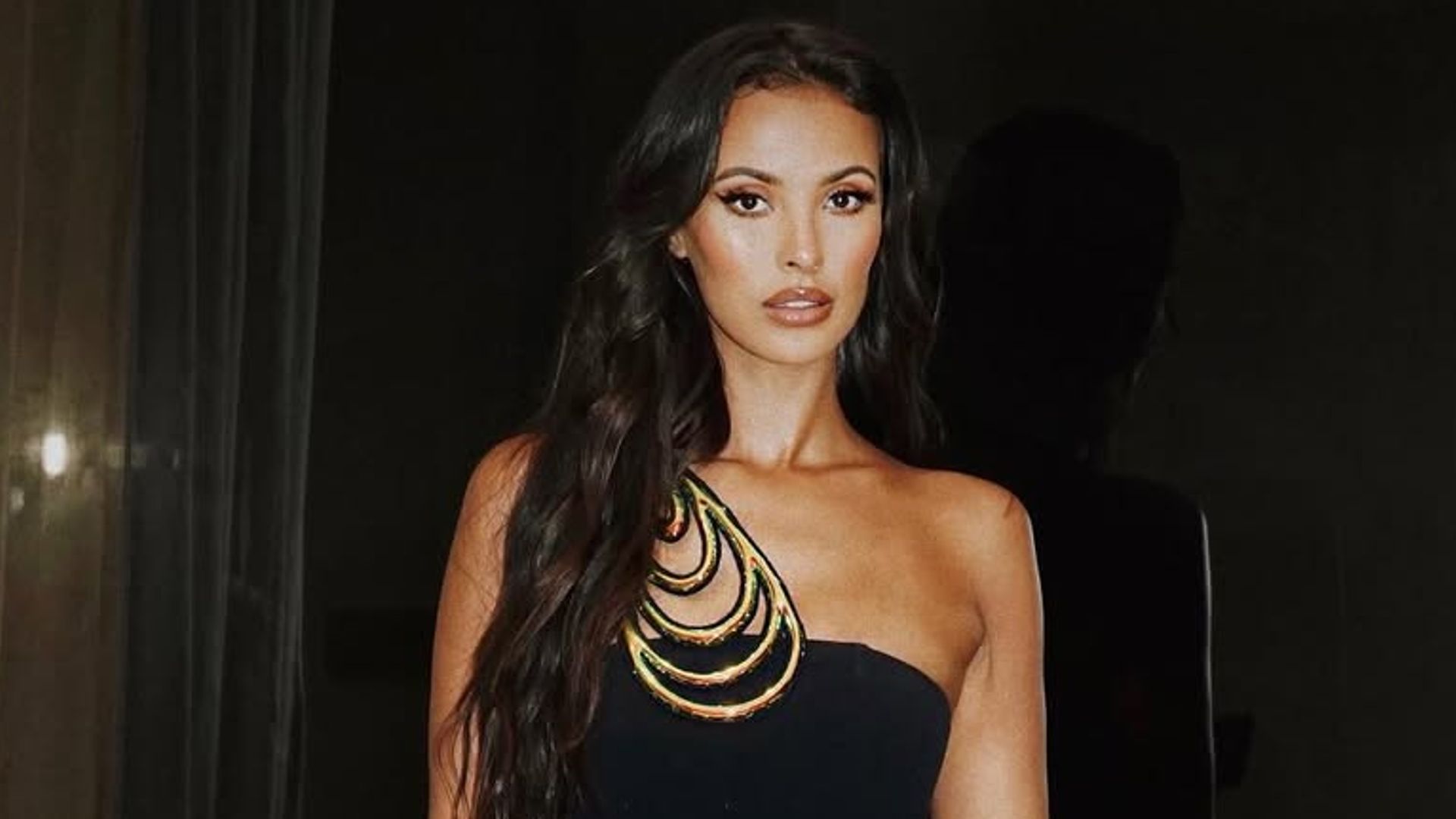 maya jama in tiny black dress and mega thigh high boots