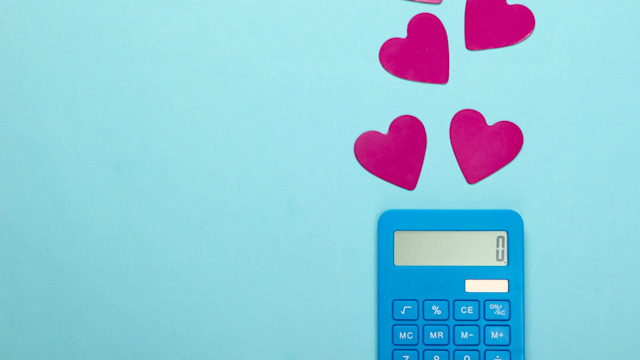 Calculator with hearts on a blue background