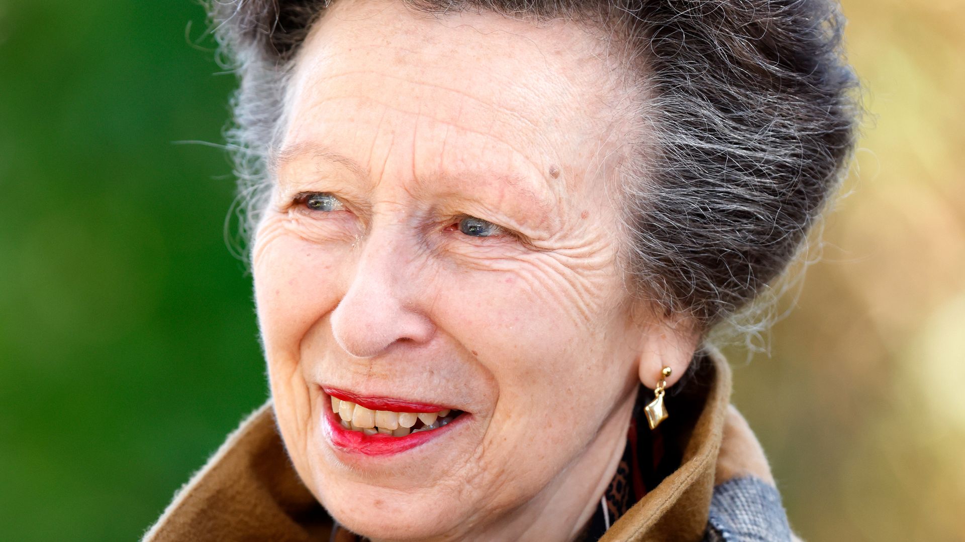 Princess Anne close up wearing red lipstick