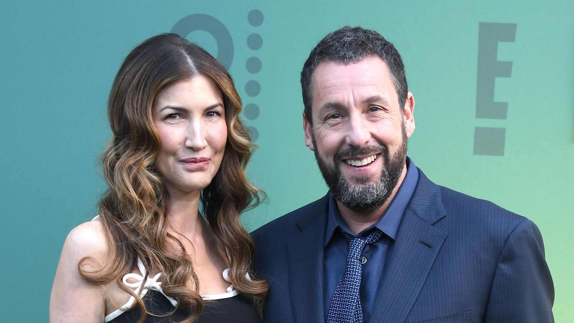 Adam Sandler's teen daughter Sunny towers over famous parents and older